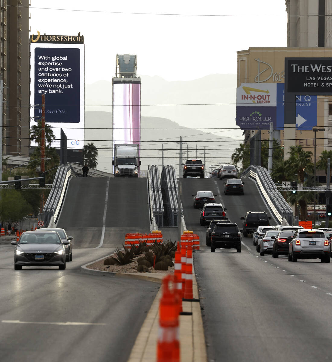 OCT. 27, 2023: Motorists navigate over the completed temporary Las Vegas Grand Prix Flamingo br ...