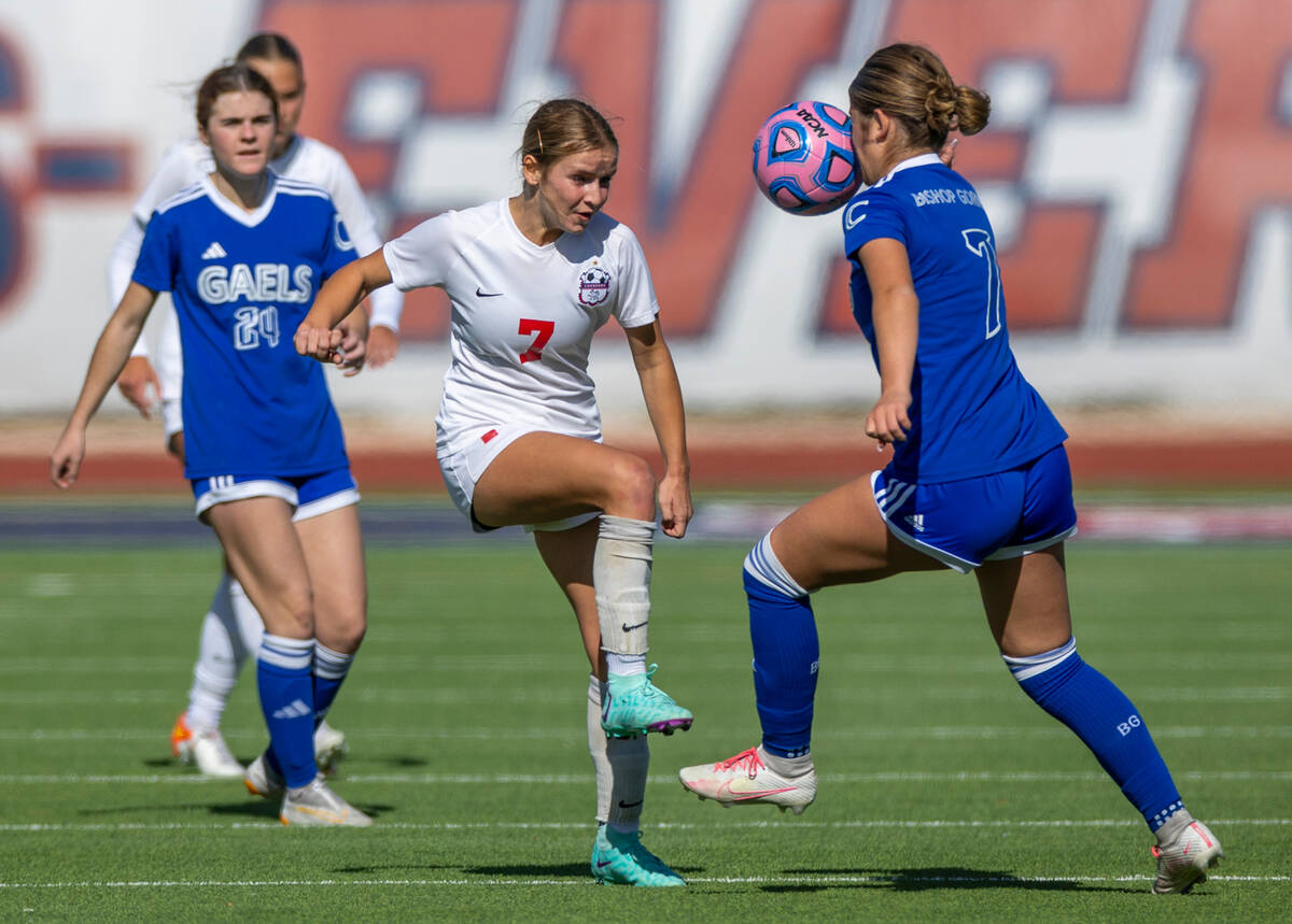 Coronado defender Kerrigyn Lynam (7) kicks the ball into the face of Bishop Gorman midfielder K ...