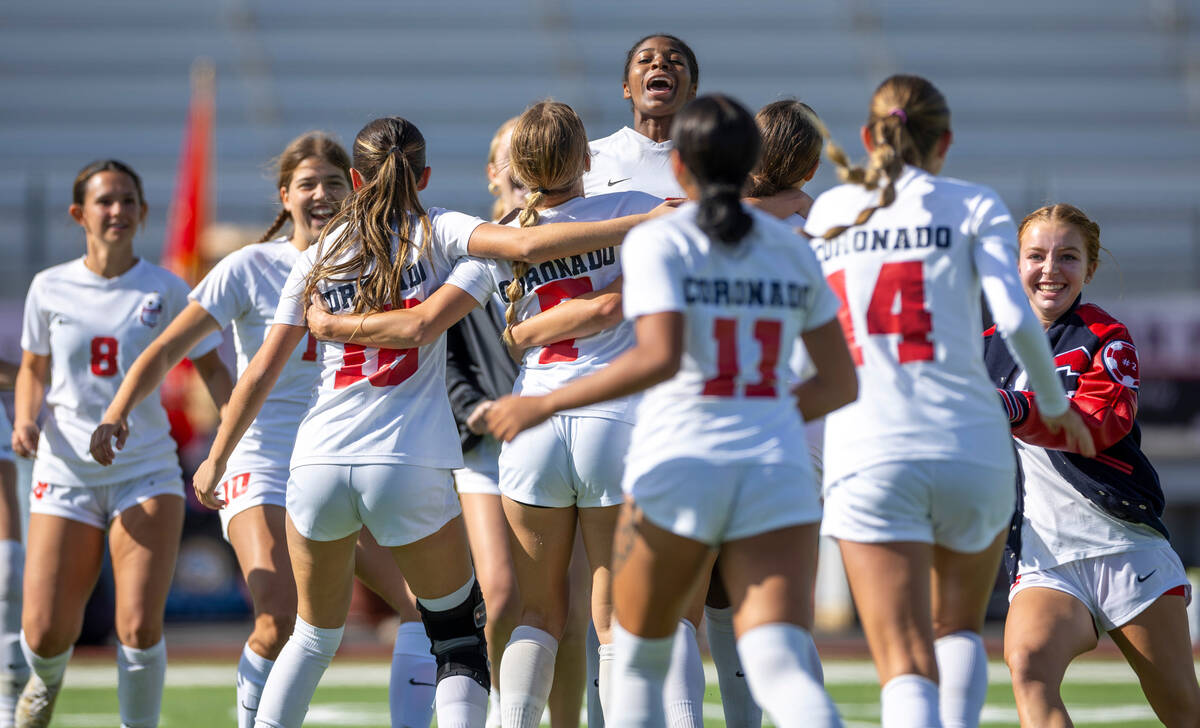 Coronado players celebrate their 1-0 win against Bishop Gorman after the second half of their C ...