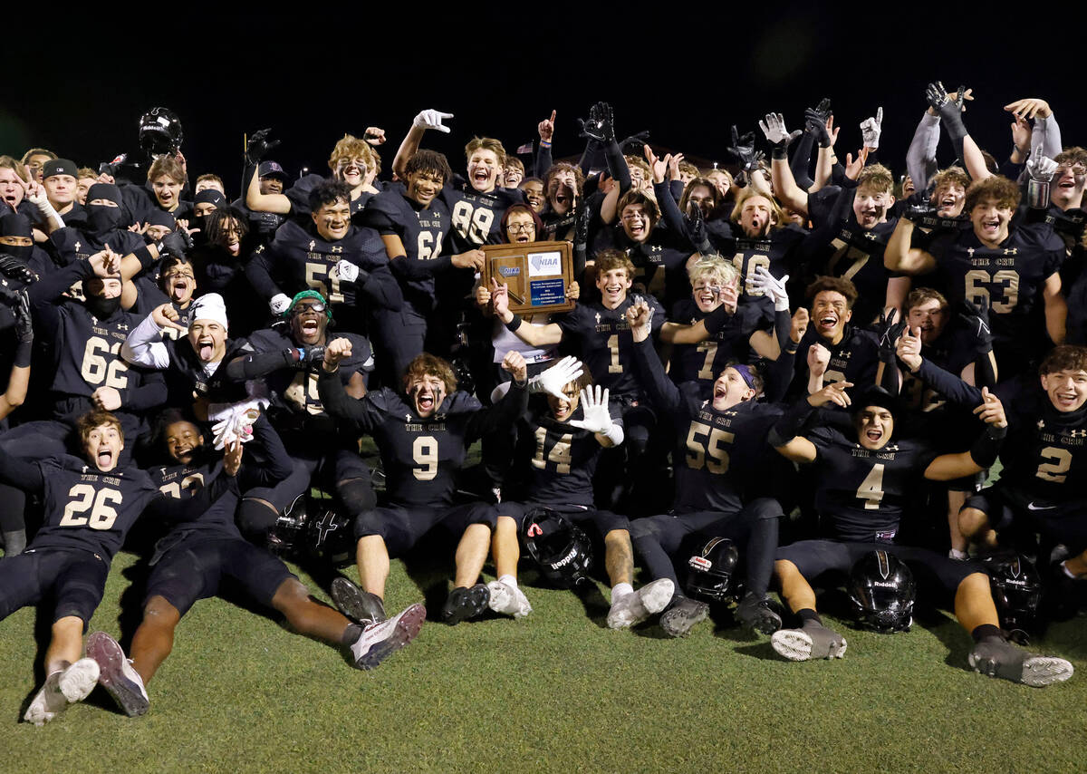 Faith Lutheran players celebrate their win against Green Valley after Class 5A Division II Sout ...