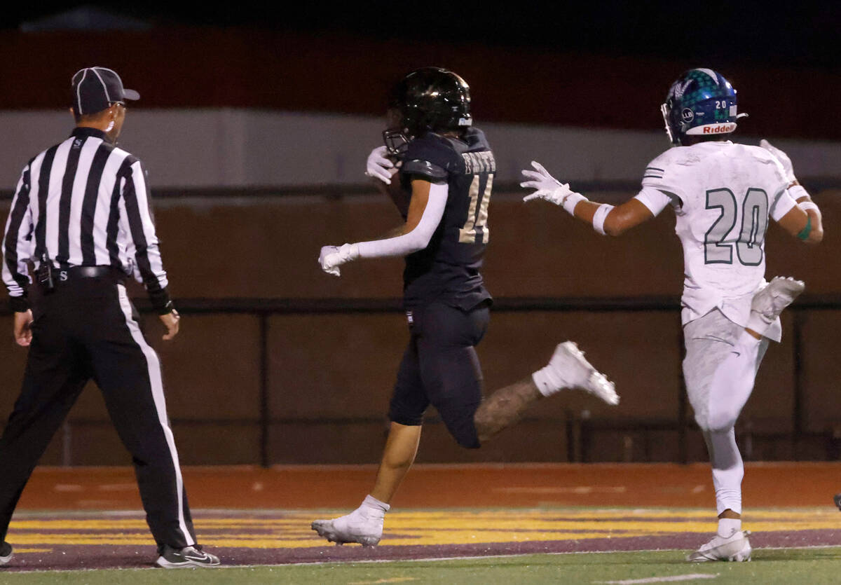 Faith Lutheran's Cale Breslin (14) scores a touchdown against Green Valley during the second ha ...