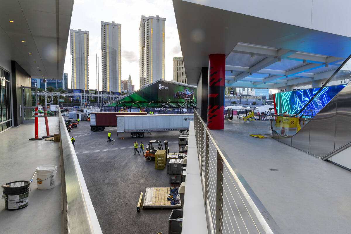 The entrance area is illuminated with light panels as construction continues outside and within ...