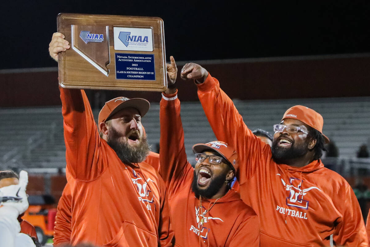 Legacy High School coaches celebrate winning the Class 5A Division III Southern League champion ...