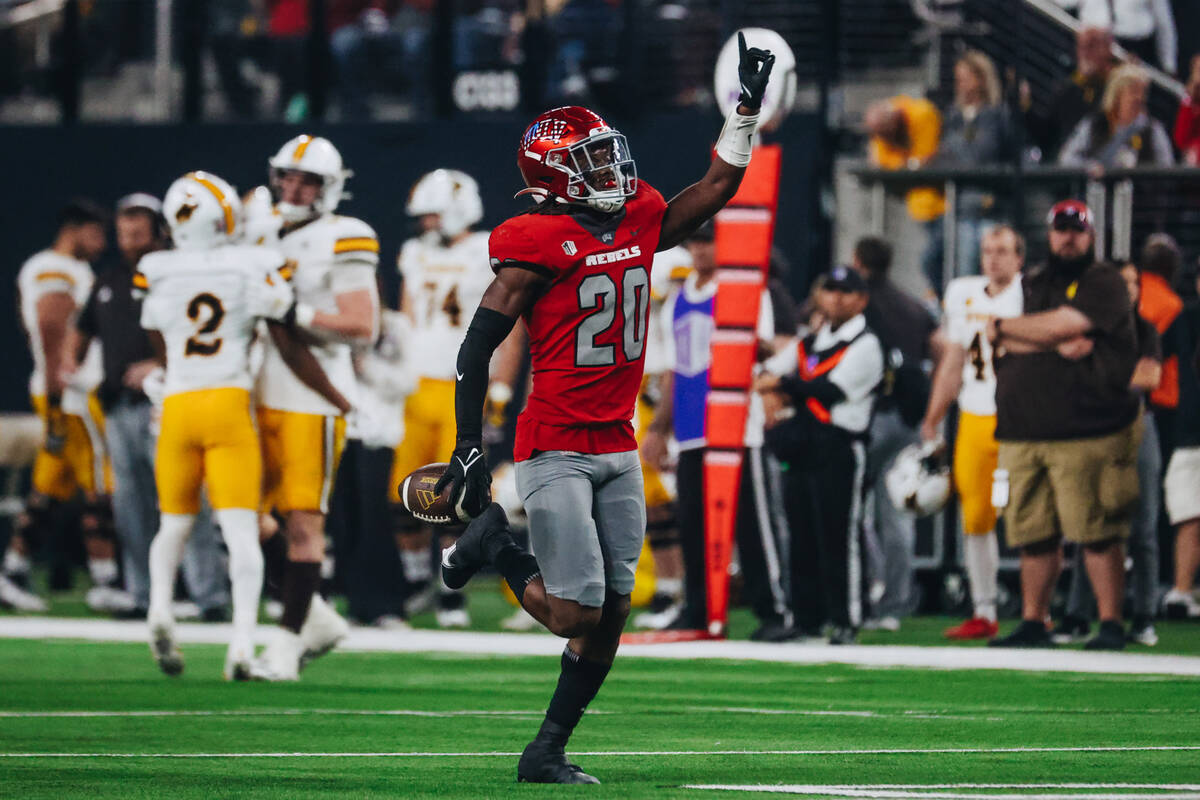 UNLV defensive back Trenton Holloway (20) celebrates an incomplete pass by Wyoming during a gam ...