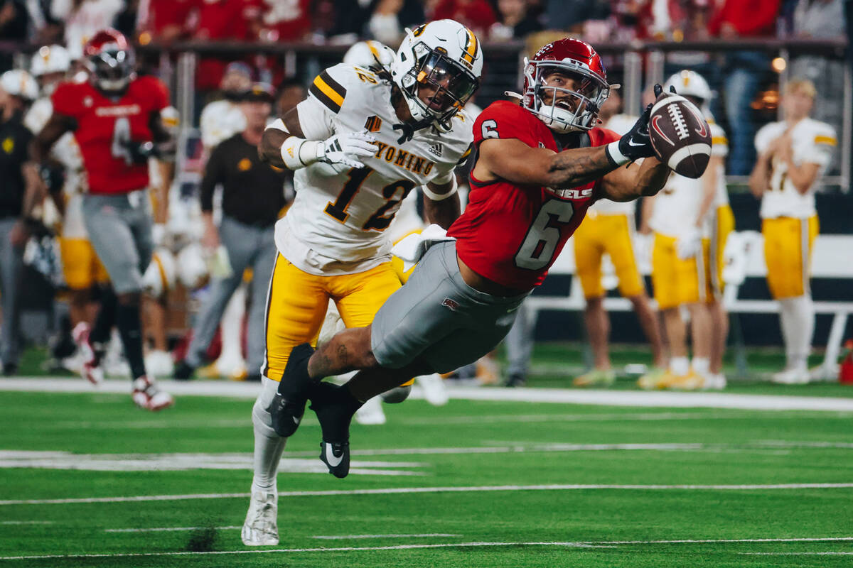 UNLV defensive lineman Naki Fahina (6) fails to grab the ball during a game against Wyoming at ...