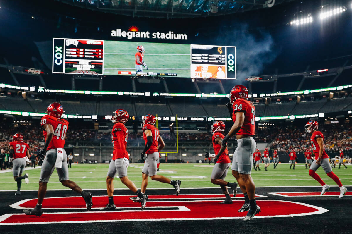 UNLV players celebrate during a game against Wyoming at Allegiant Stadium on Friday, Nov. 10, 2 ...