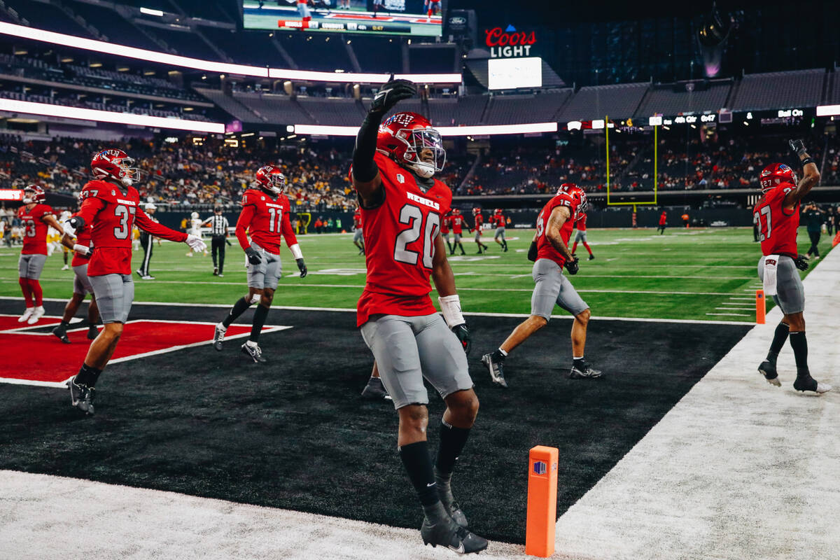 UNLV players celebrate during a game against Wyoming at Allegiant Stadium on Friday, Nov. 10, 2 ...
