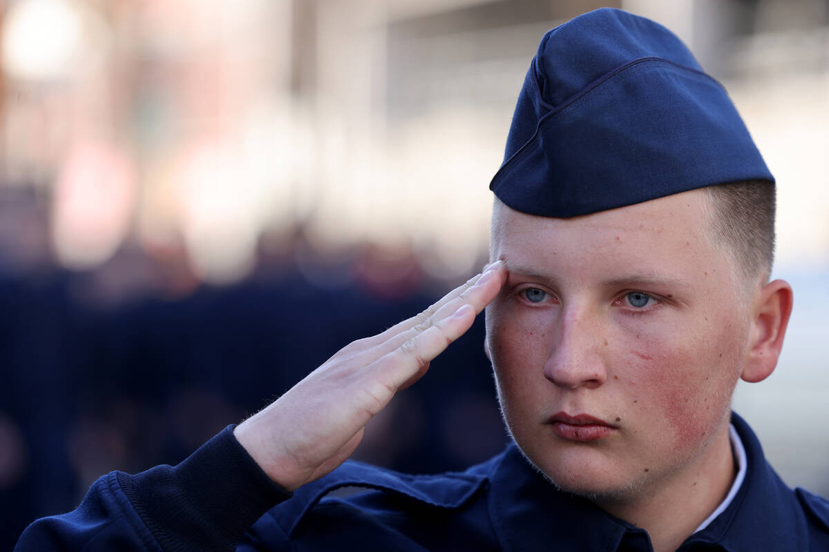 Rancho High School Air Force Junior ROTC member Aleksey Prodan marches in the Veterans Day para ...