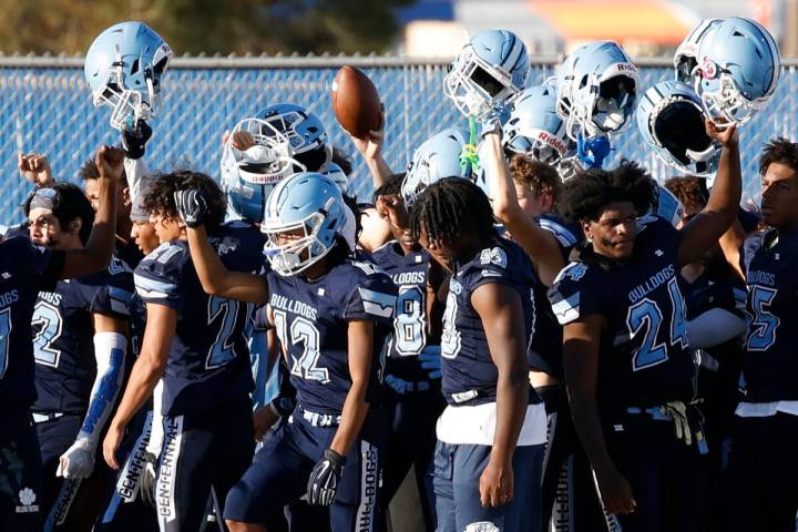 Centennial High School players gather before the first half of a football game against Silverad ...