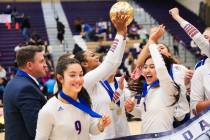 Bishop Gorman celebrates winning the class 5A girls volleyball state title match against Corona ...
