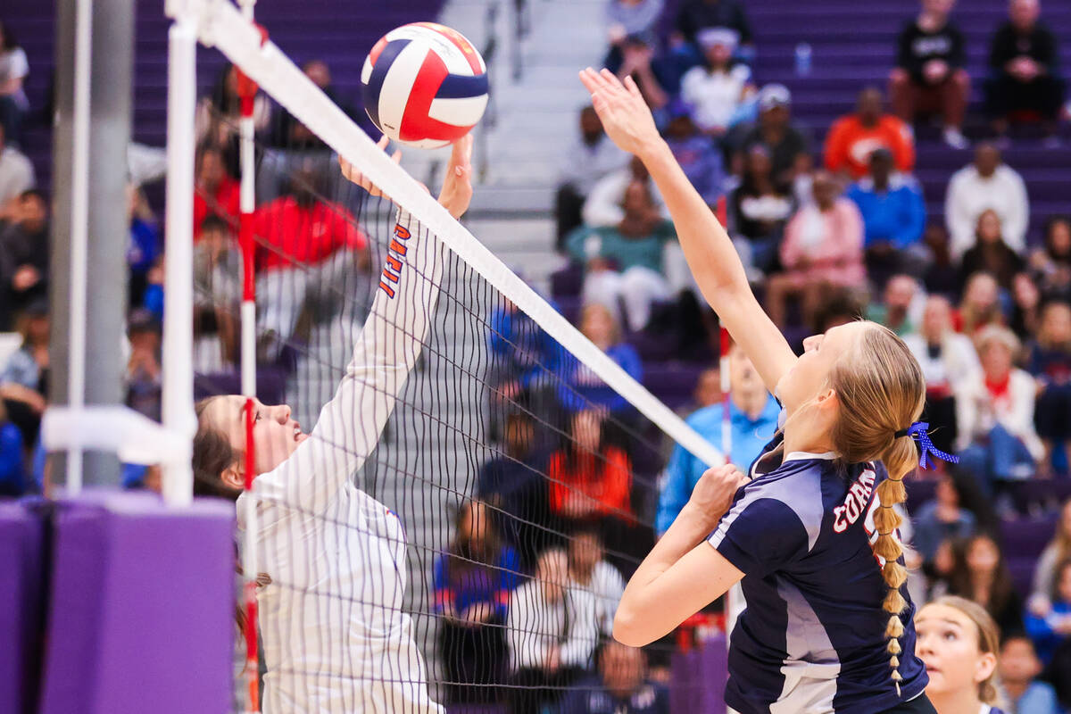 Coronado and Bishop Gorman go head to head at the net during the class 5A girls volleyball stat ...