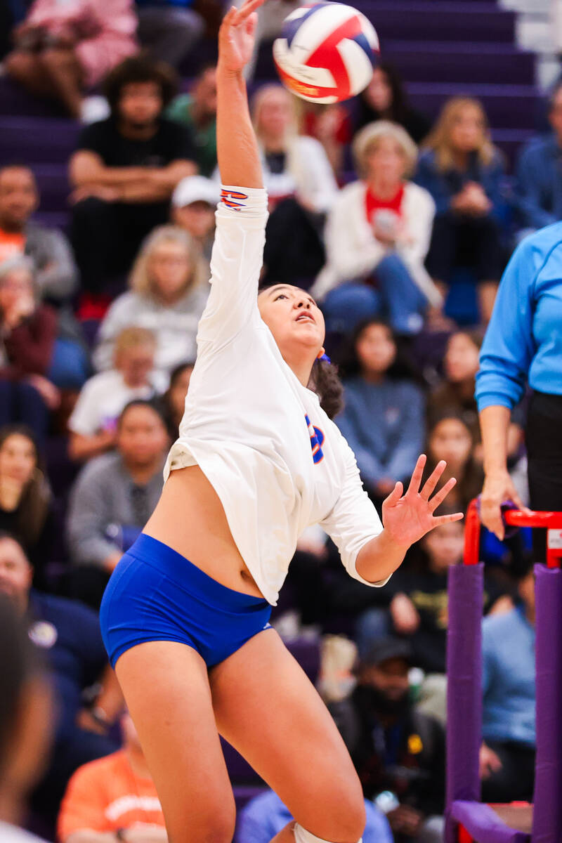 Bishop Gorman’s Leilia Toailoa (18) spikes the ball during the class 5A girls volleyball ...