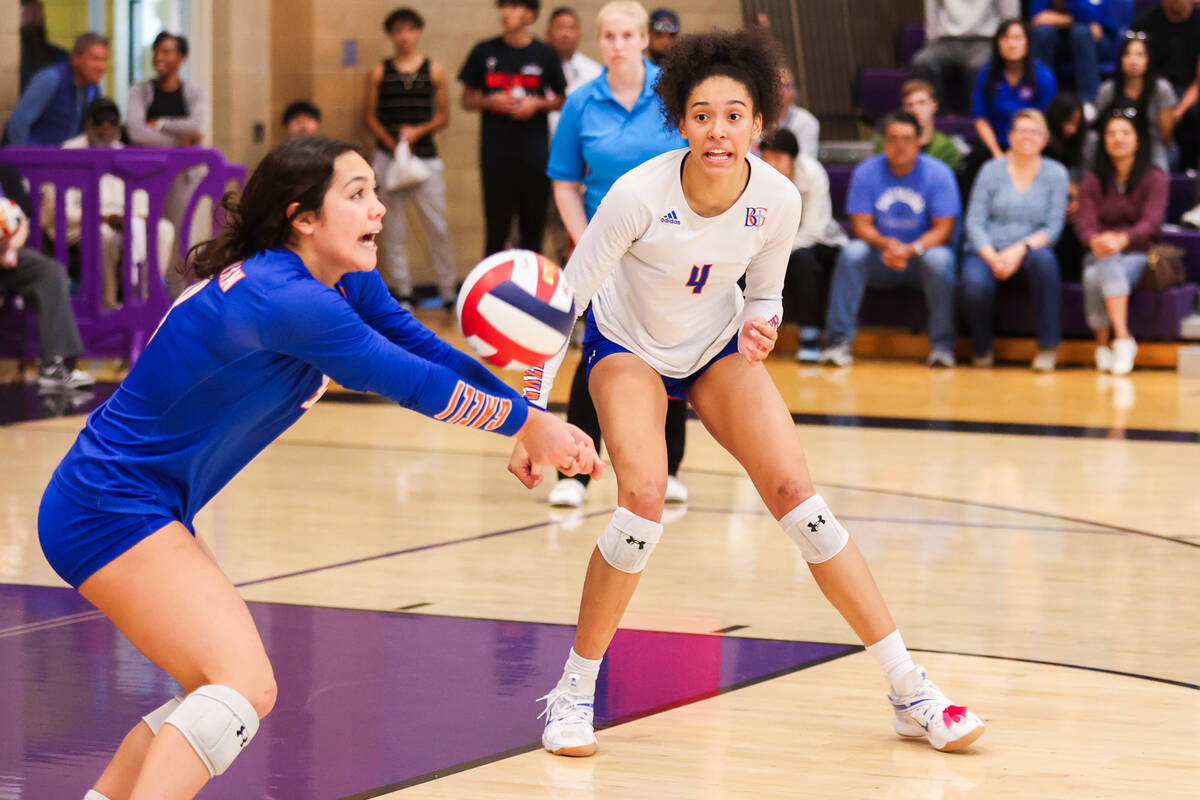 Bishop Gorman’s Ayanna Watson (4) watches as her teammate Tatum Thompson (8) bumps the b ...