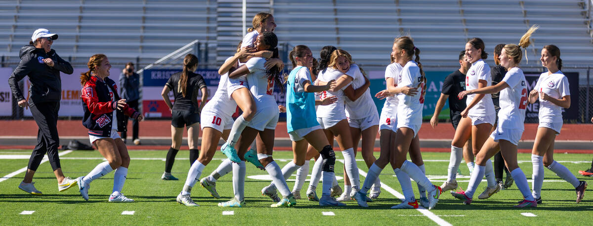 Coronado players and coaches celebrate their 2-1 win against Faith Lutheran during their Class ...