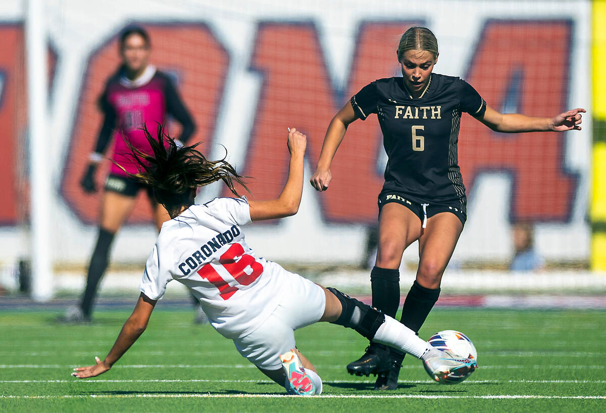 Faith Lutheran defender Jacey Phillips (6) deflects away a pass by Coronado defender Mia Schlac ...