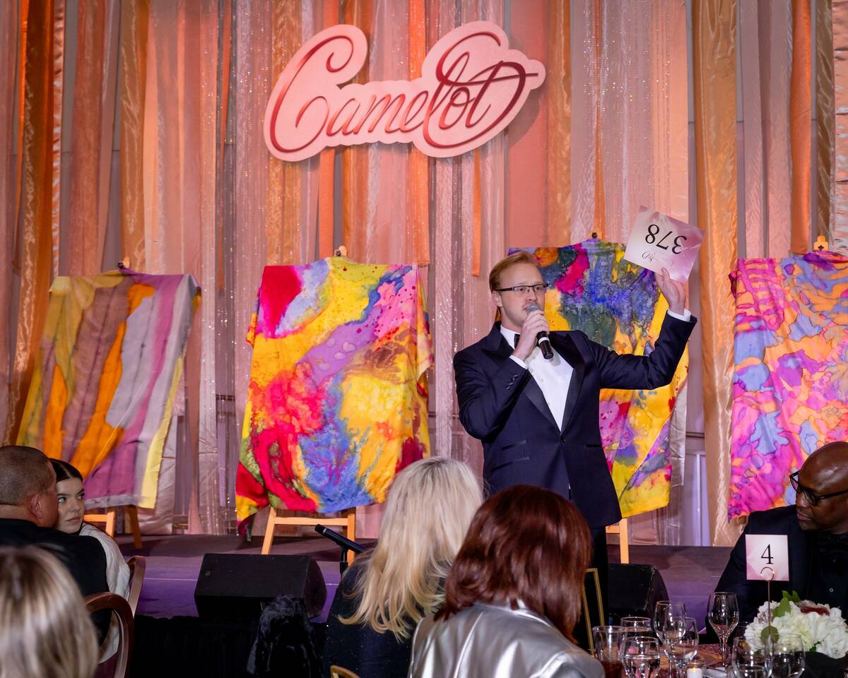 Auctioneer Parker Kolberg is shown the annual Camelot gala at the newly renamed Linda & Christo ...