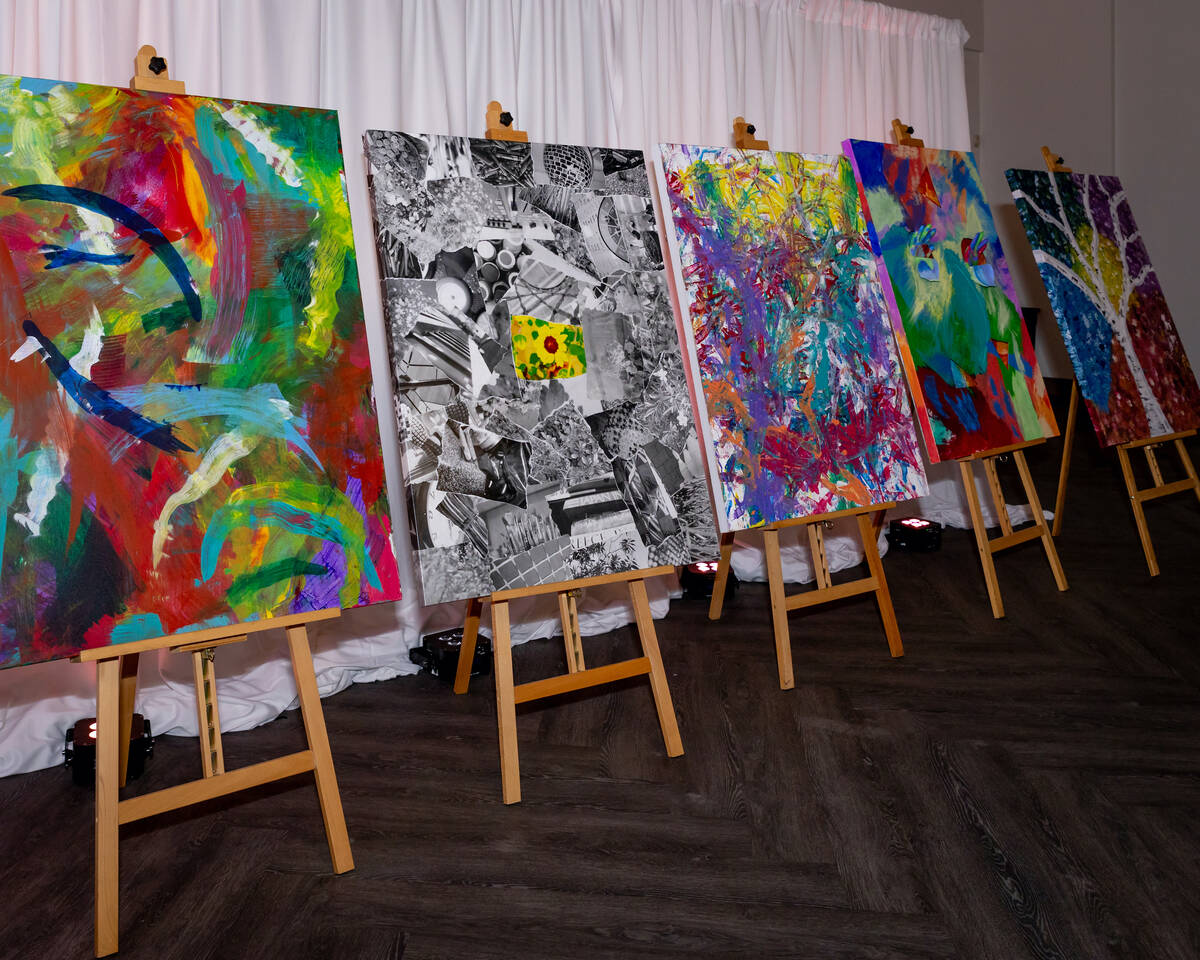 Paintings sold at the live auction are shown during the annual Camelot gala at the newly rename ...