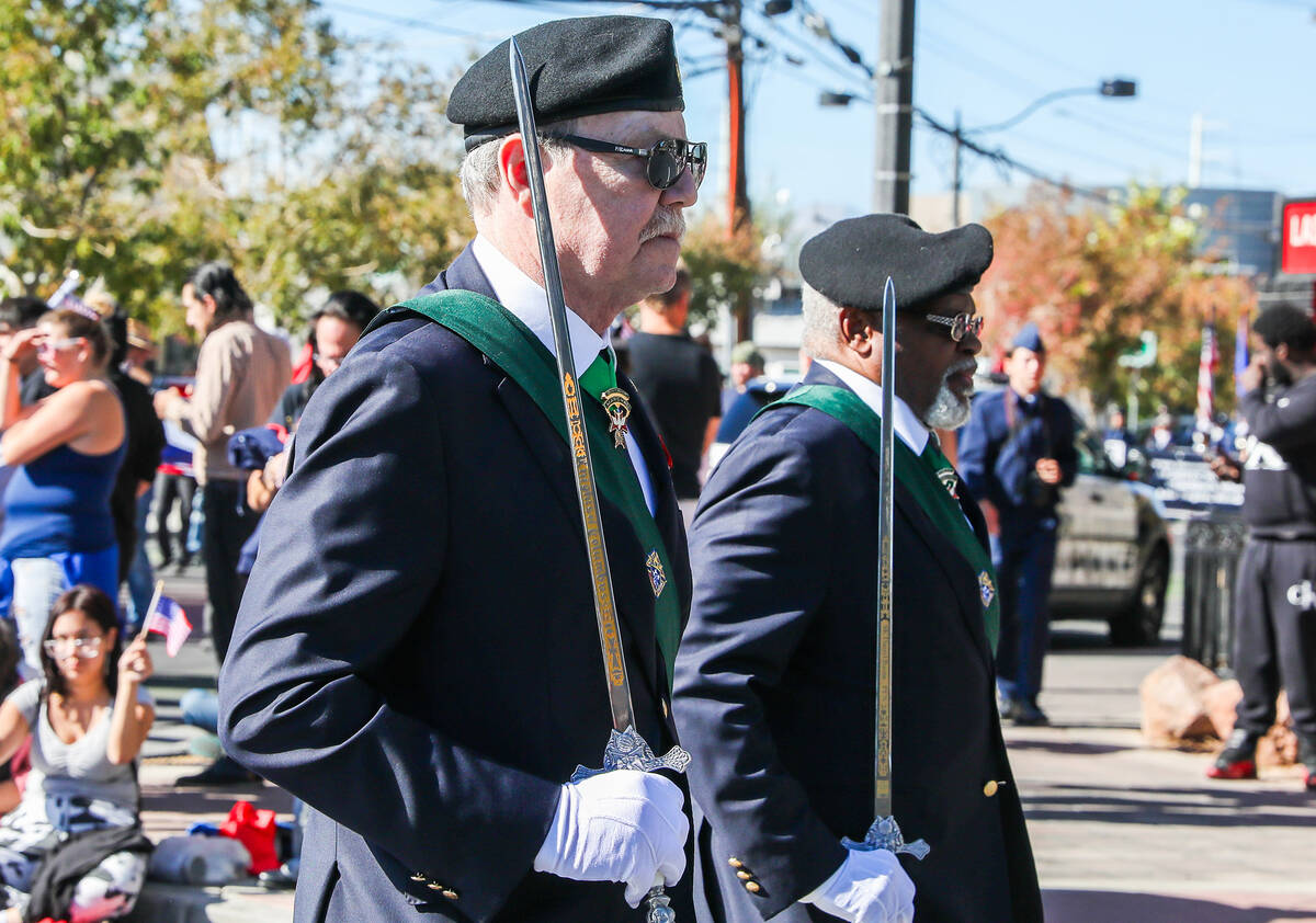 Knights of Columbus Veterans march during the annual Veterans Day parade on 4th Street in downt ...