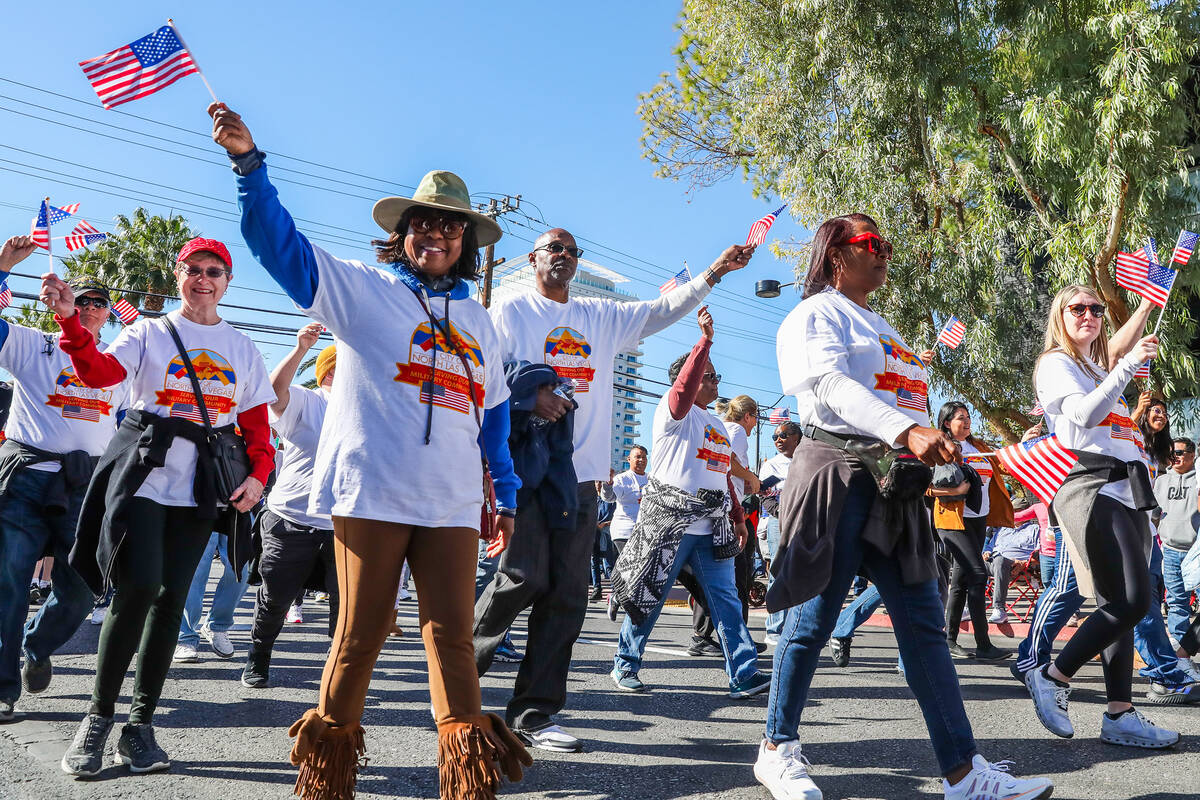 People representing North Las Vegas Veterans march during the annual Veterans Day parade on 4th ...