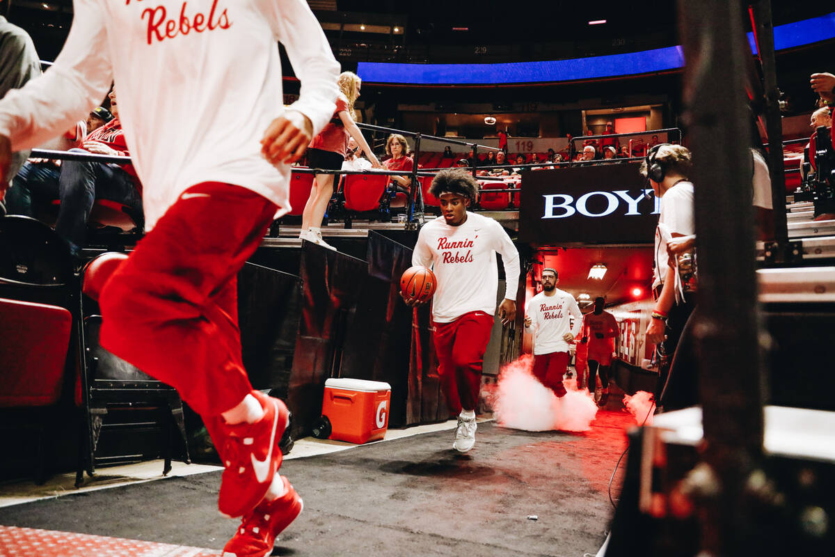 UNLV basketball players take to the court before a game against Stetson at Thomas & Mack Ce ...