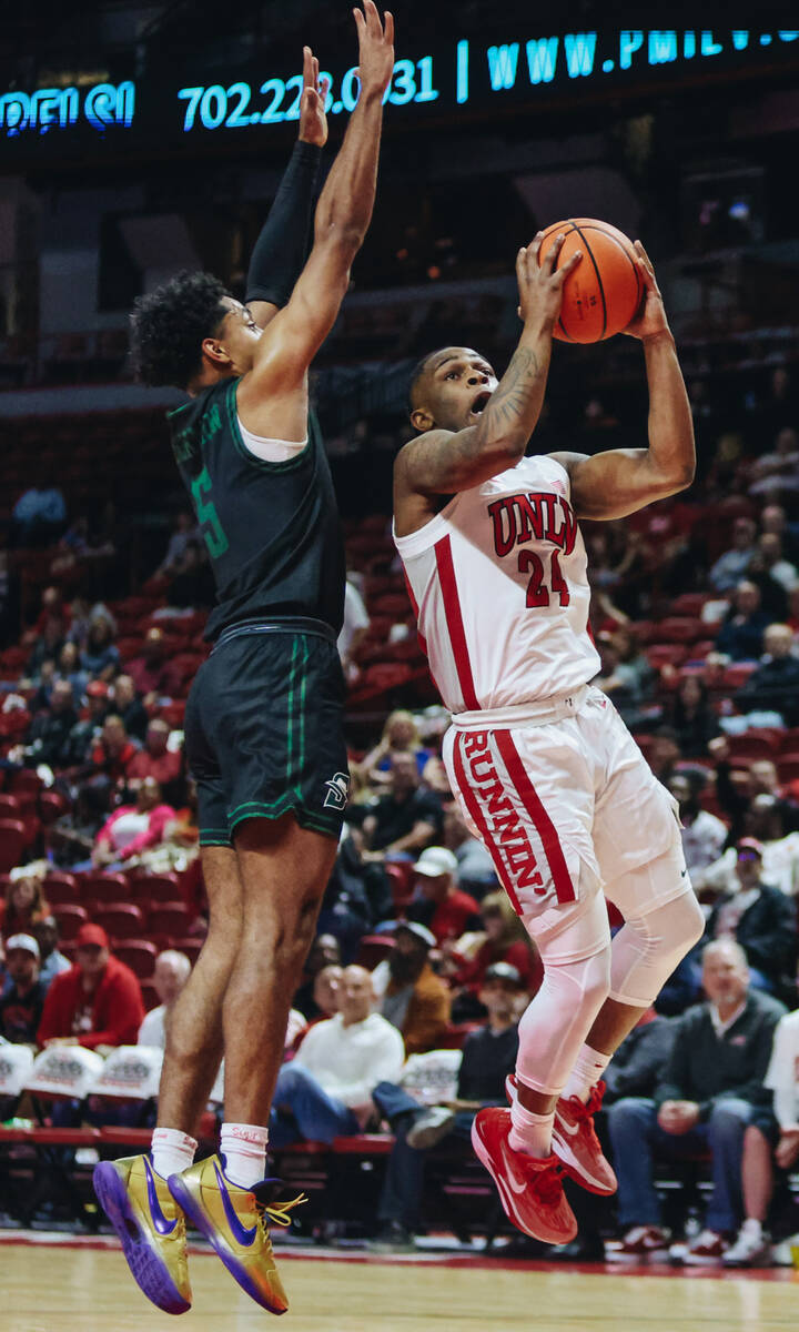 UNLV guard Jackie Johnson III (24) jumps for a basket during a game against Stetson at Thomas & ...