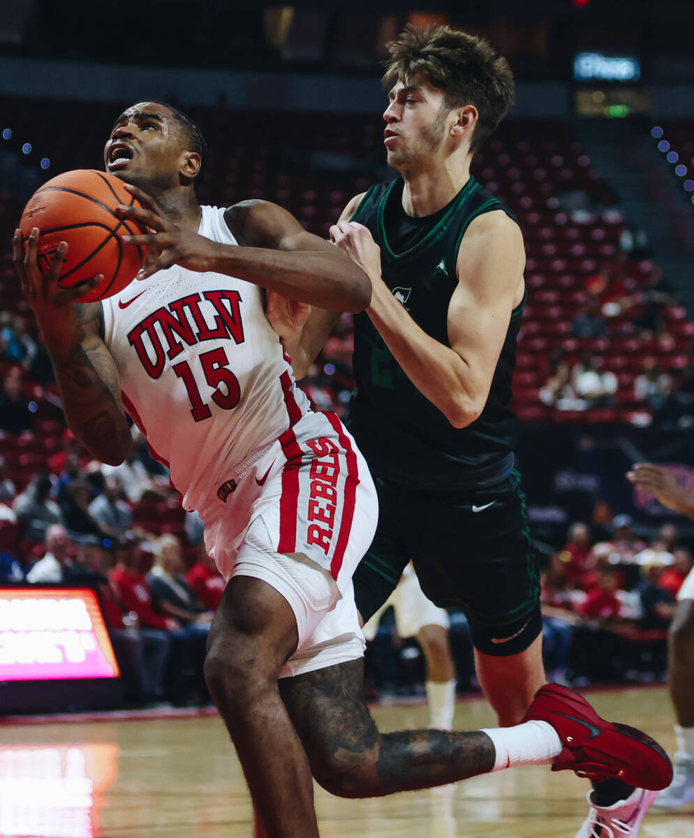 UNLV guard Luis Rodriguez (15) looks to make a basket during a game against Stetson at Thomas & ...