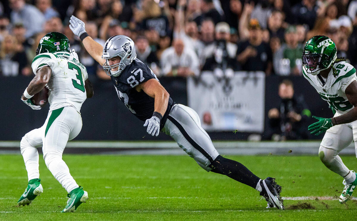 Raiders tight end Michael Mayer (87) dives to tackle New York Jets safety Jordan Whitehead (3) ...