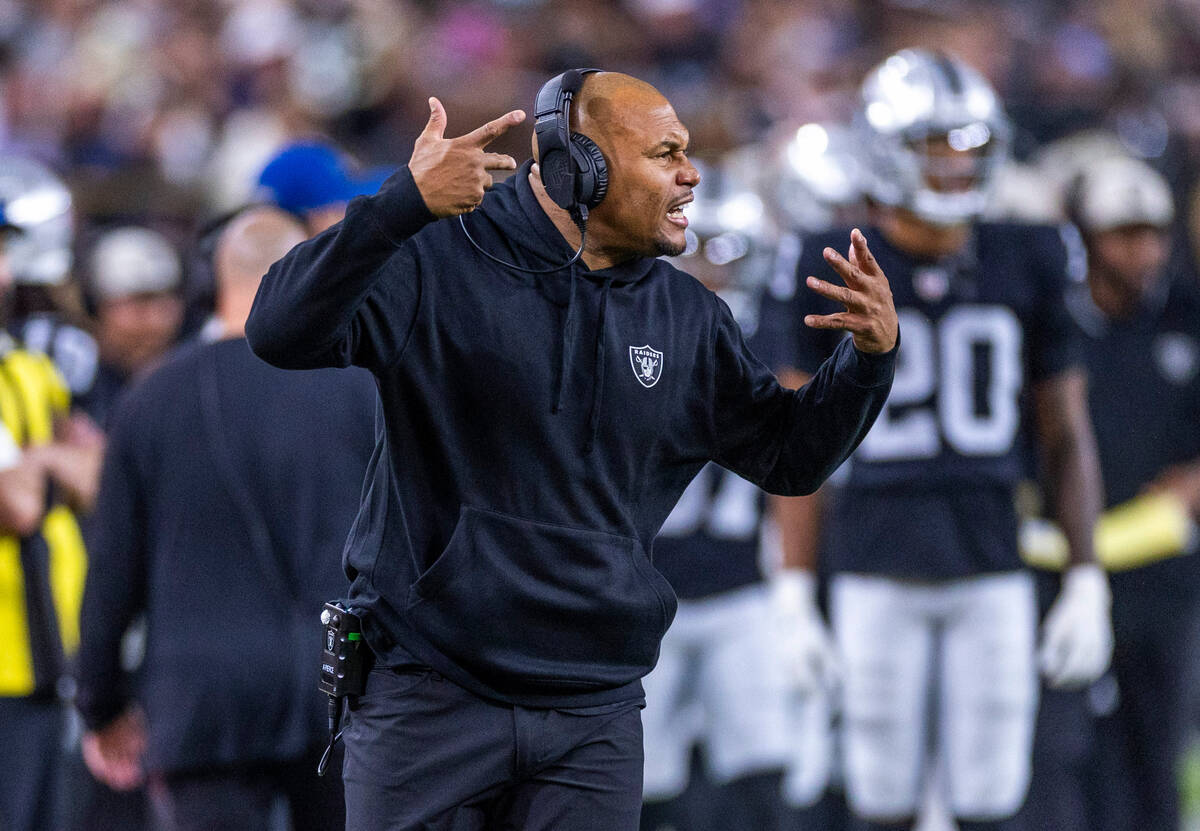 Raiders head coach Antonio Pierce yells to his players against the New York Jets during the sec ...