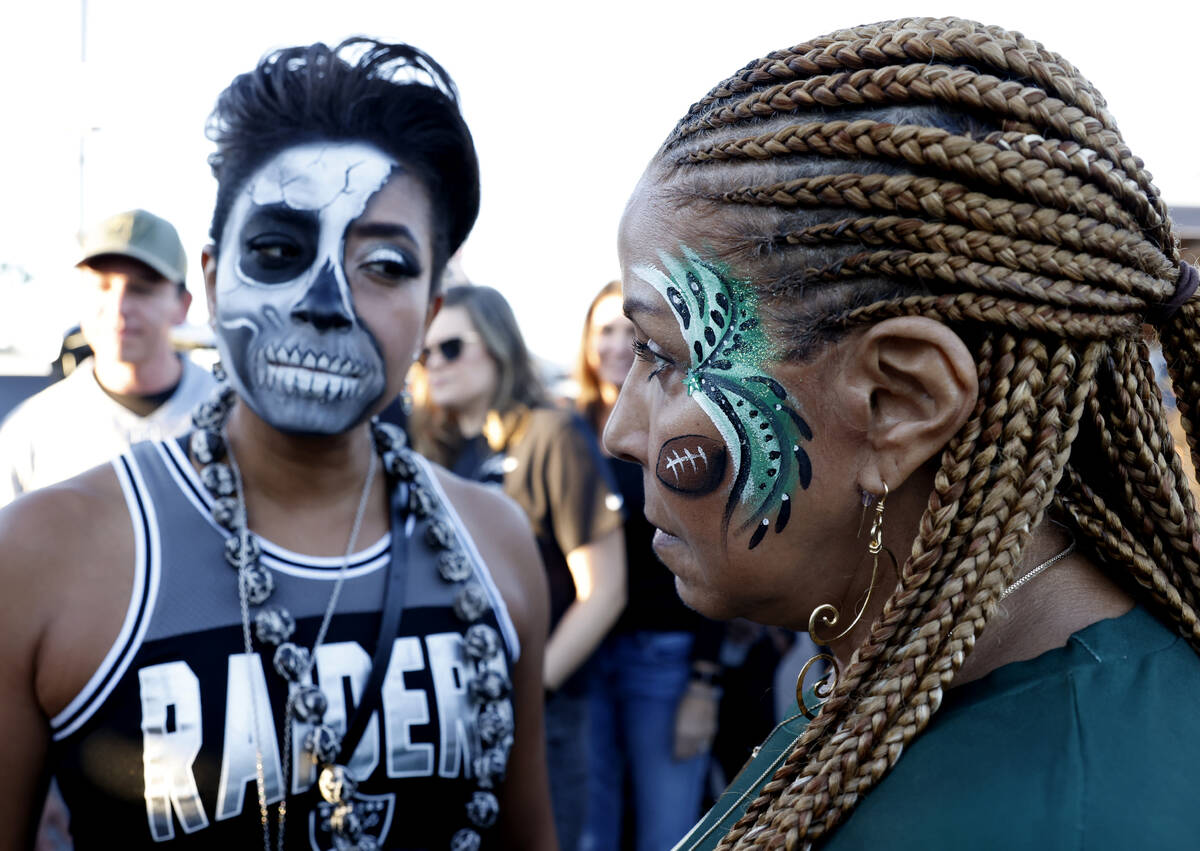Raiders fan Jenel-Stunt Thompson, left, and her mother-in-law and New York fan Gloria Stevens s ...