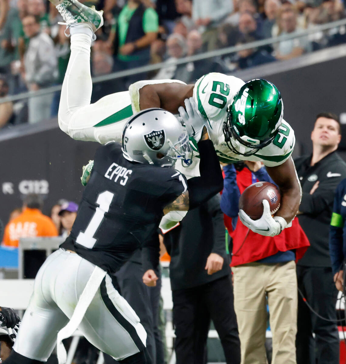Raiders safety Marcus Epps (1) tackles New York Jets running back Breece Hall (20) during the f ...