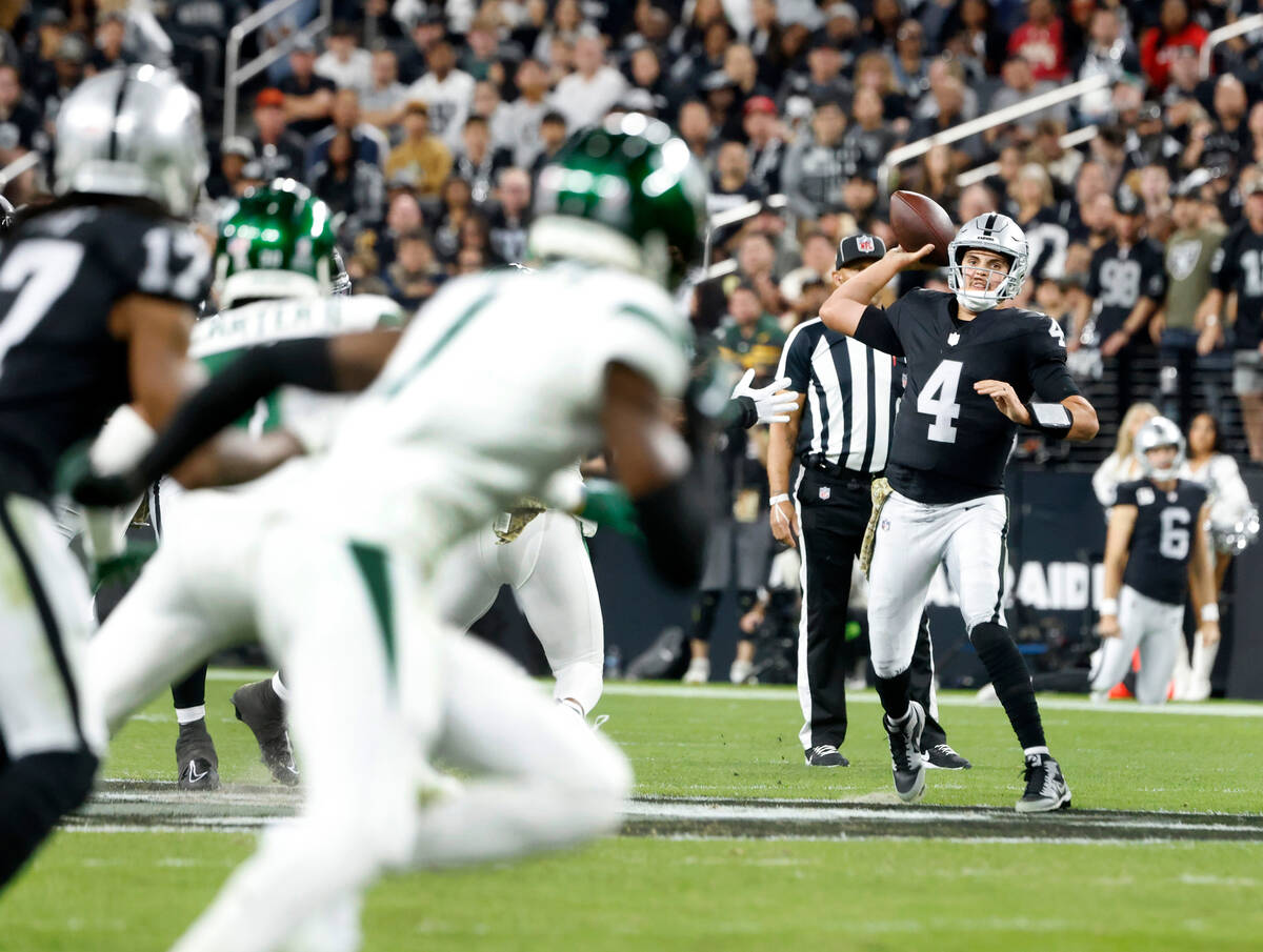 Raiders quarterback Aidan O'Connell (4) throws a pass against New York Jets during the second h ...