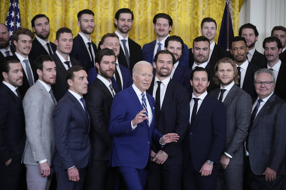 President Joe Biden stands for a photo during an event to celebrate the Vegas Golden Knights in ...