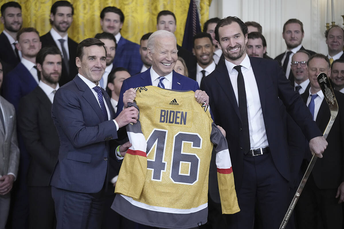 President Joe Biden holds a jersey during an event to celebrate the Vegas Golden Knights in the ...