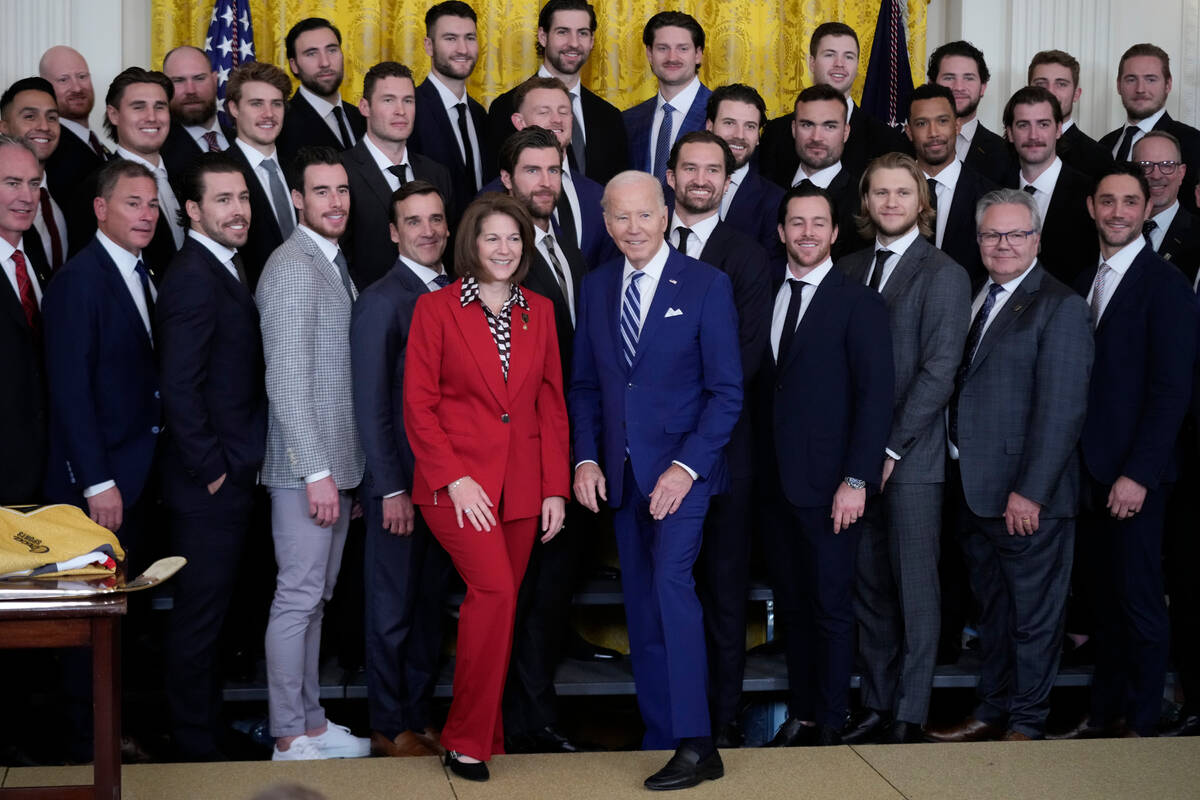 President Joe Biden stands for a photo during an event to celebrate the Vegas Golden Knights in ...