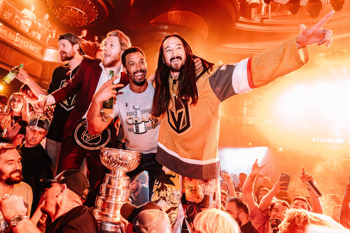 DJ Steve Aoki poses with members of the Vegas Golden Knights and the Stanley Cup at Omnia at Ca ...