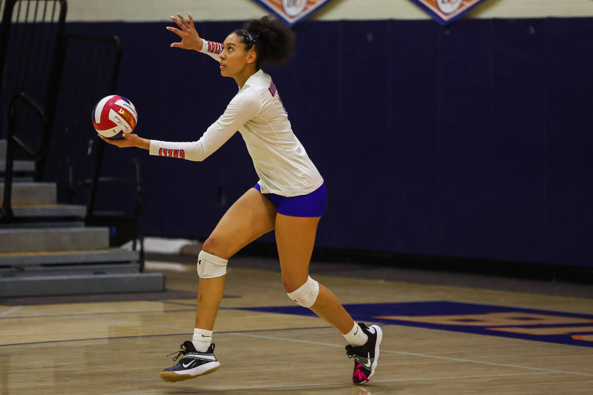 Bishop Gorman outside hitter Ayanna Watson serves the ball during a match against Shadow Ridge ...