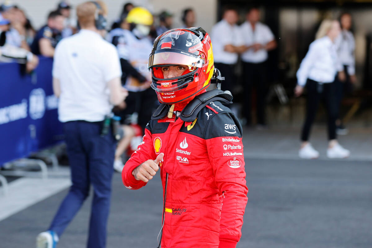 Ferrari's Carlos Sainz, of Spain, gives a thumbs up after the pole position race of the Formula ...