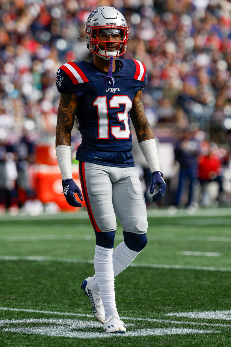 New England Patriots cornerback Jack Jones (13) reacts during the first half of an NFL football ...