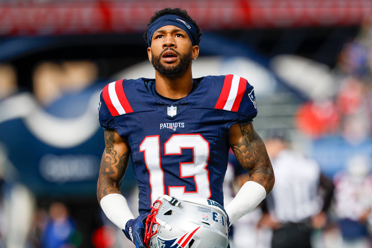 New England Patriots cornerback Jack Jones (13) takes the field before the start an NFL footbal ...