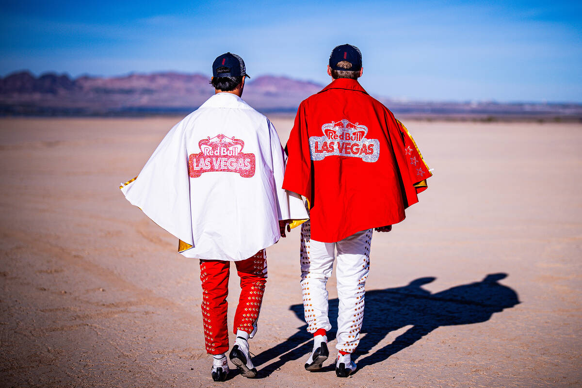 Oracle Red Bull Racing drivers Max Verstappen and Sergio Perez in "Viva Las Vegas" race suits i ...