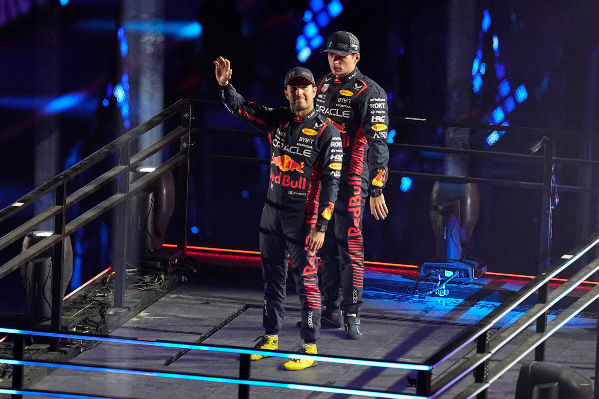 Red Bull driver Sergio Perez, of Mexico, left, and Red Bull driver Max Verstappen, of the Nethe ...