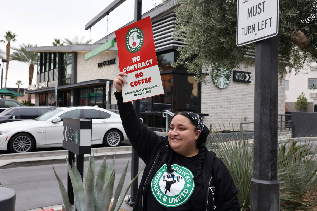 Starbucks barista Raven Rosales pickets at the Casino Center Boulevard and Clark Avenue store i ...