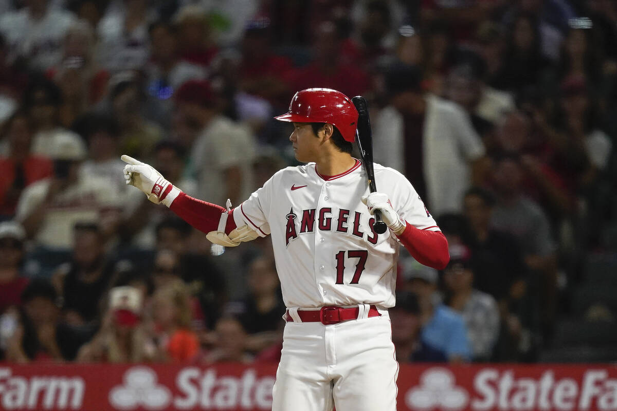 Los Angeles Angels' Shohei Ohtani reacts after swinging at a pitch during the ninth inning of t ...