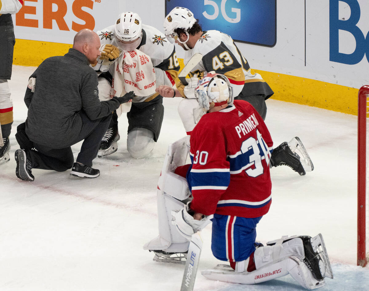 Montreal Canadiens goaltender Cayden Primeau (30) looks on as Vegas Golden Knights' Pavel Dorof ...