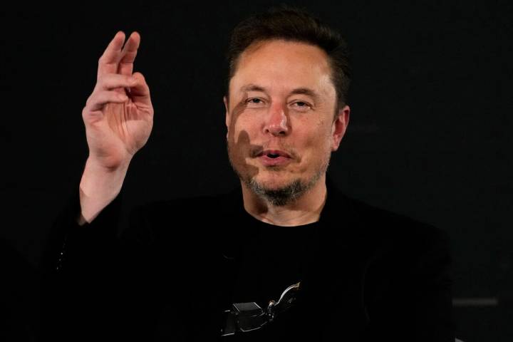 Elon Musk, owner of social media platform X, gestures during an event with Britain's Prime Mini ...