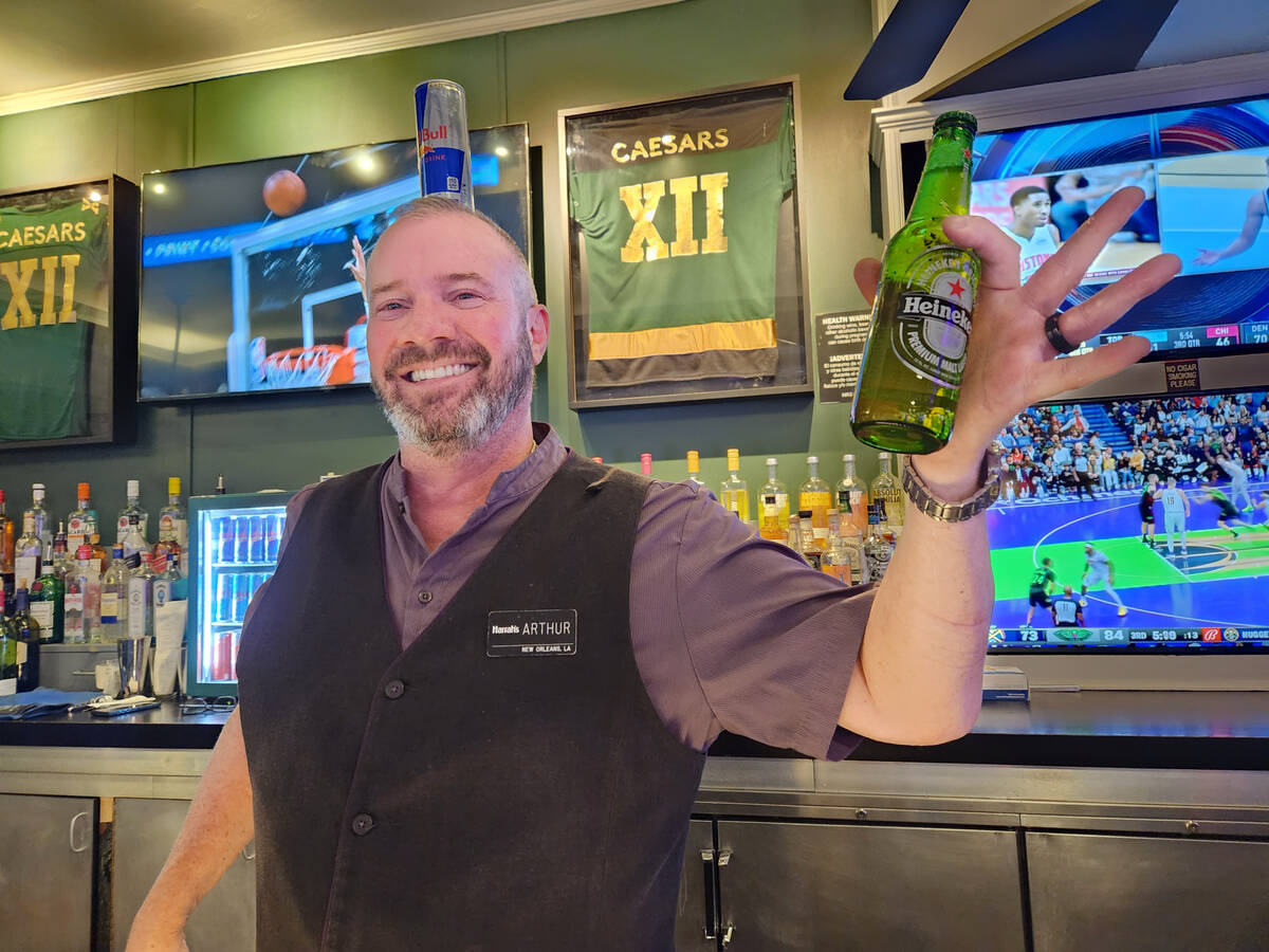 Arthur Blair, a bartender at Harrah’s, said he can serve up to a 1,000 people a night on a bu ...