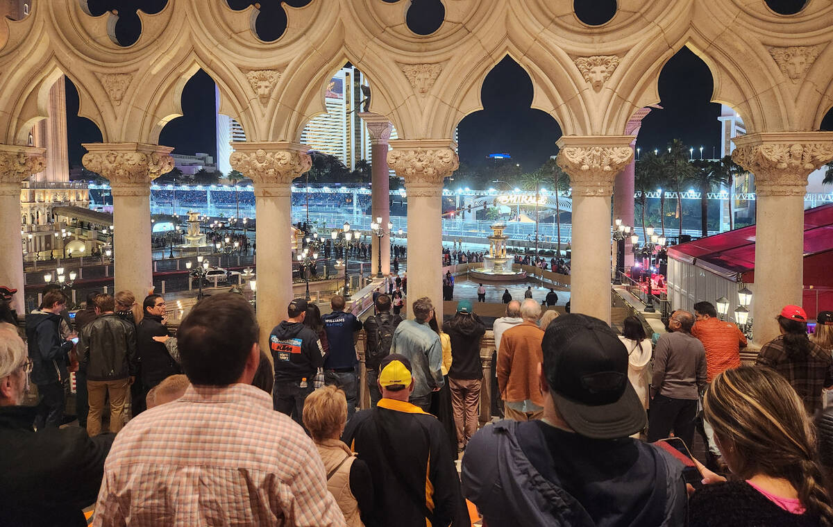 The second floor pedestrian walkway at The Venetian is packed as there are partial free views o ...