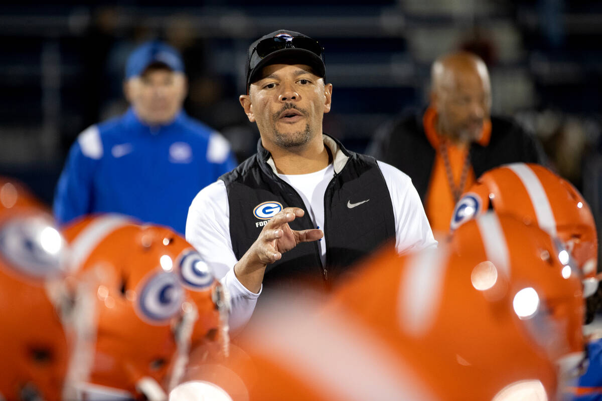 Bishop Gorman head coach Brent Browner speaks to his team after they won a Class 5A Division I ...