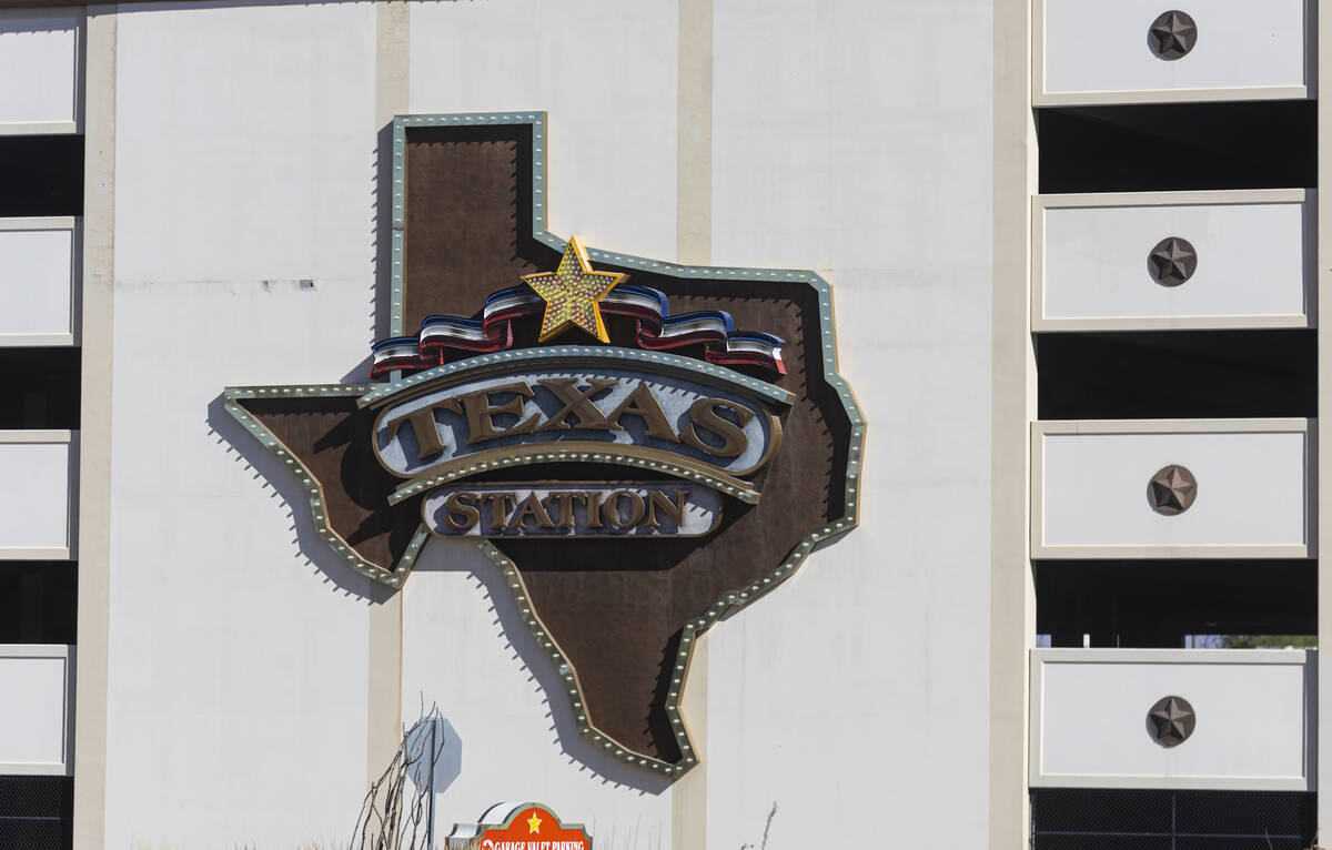 A logo for Texas Station is seen on a parking garage as demolition continues on Thursday, Oct. ...