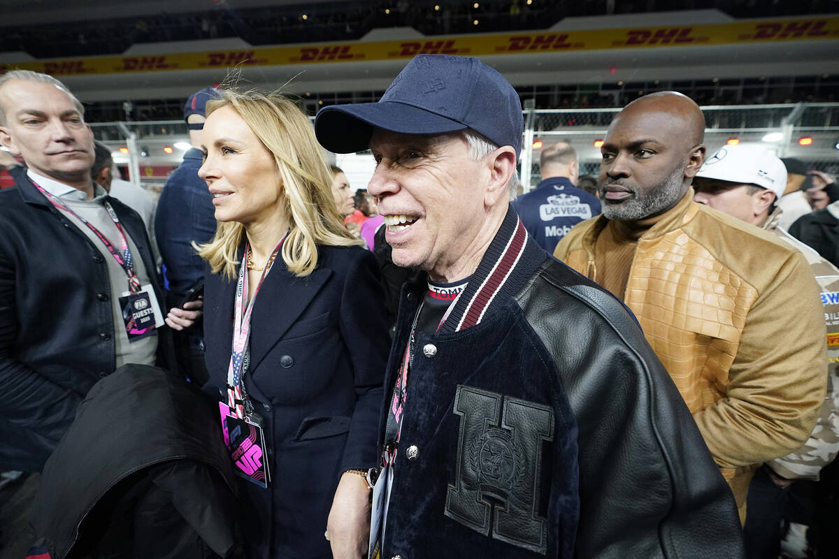 Designer Tommy Hilfiger, and Corey Gamble, right, attend the Formula One Las Vegas Grand Prix a ...